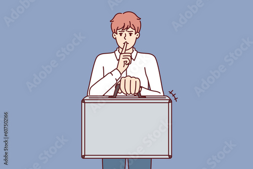 Business man holds suitcase and calls for silence without disclosing terms of contract and NDA rules for company employees. Concept of giving bribe or selling insider information for business purposes