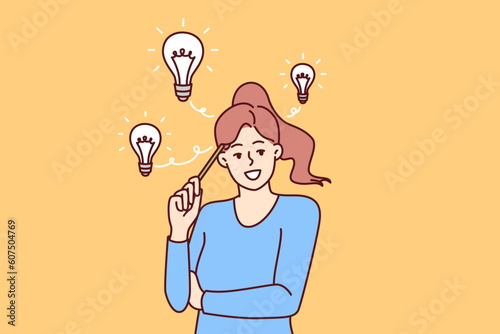 Teenager girl with light bulbs over head comes up with idea and holds pencil near temple. Smart schoolgirl comes up with idea for essay wishing to apply for educational grant at university
