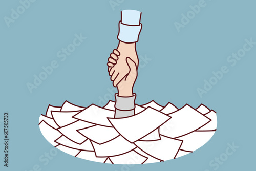 Hand among papers and documents asks for help and salvation from bureaucracy and overabundance paperwork that causes burnout. Helping hand for person suffering from work overload or bureaucracy