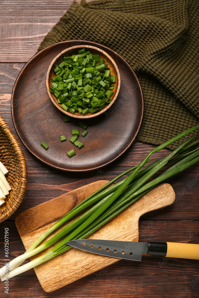 Fresh green onion on wooden background Fresh green onion on wooden background