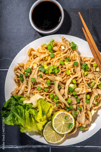 Asian shimeji noodles dish. Chow Mein noodles pasta, with stir fried vegetables, soy sauce and shimeji mushrooms