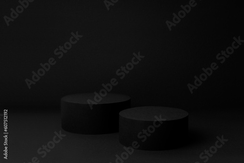 Abstract black stage with two round podiums mockup for presentation cosmetic products, goods, advertising, design in soft gradient color, in elegant rich style.