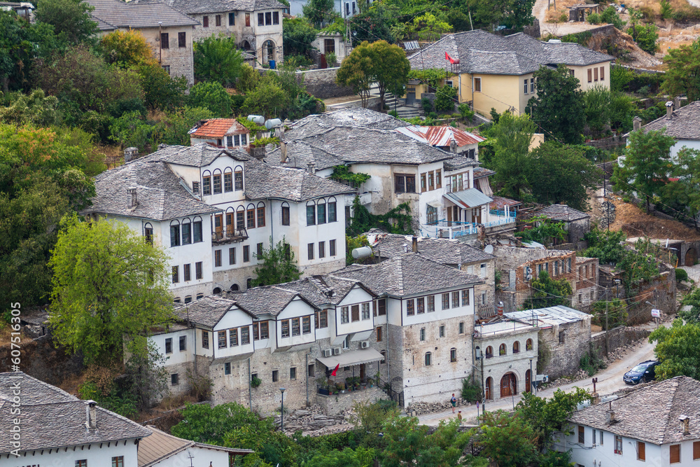 Cityscape of Gjirokaster old town, Albania. Christian church and old ottoman houses in Gjirokaster, Albania close-up