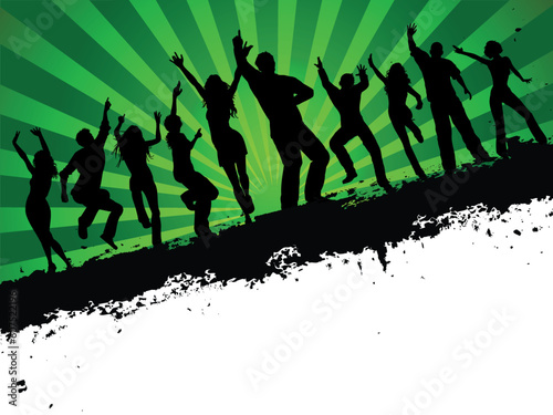 Silhouettes of people dancing on grunge background