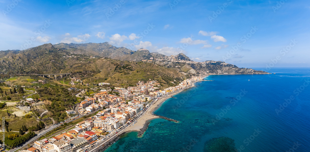 Obraz premium View with Giardini Naxos and Taormina, Sicily. Beach and sea in summer