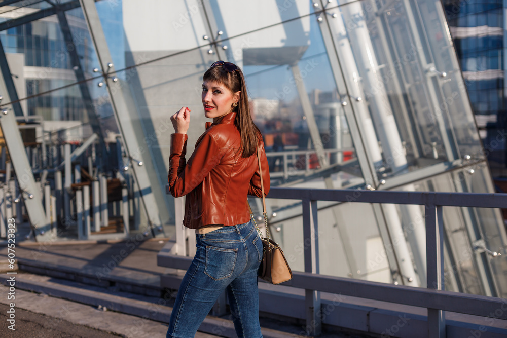 Fashion portrait of beautiful pretty model woman on urban background Fashion portrait of beautiful pretty model woman on urban background