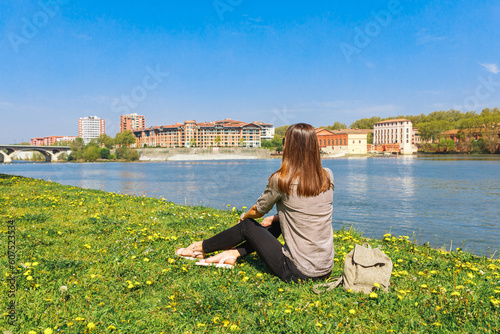 Obraz na płótnie Tourist woman near Garonne river in Toulouse, France, South Europe w salonie