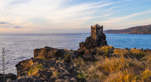 Torre Saracena old tower  Santa Tecla  Catania  Sicily. Sea and rocks