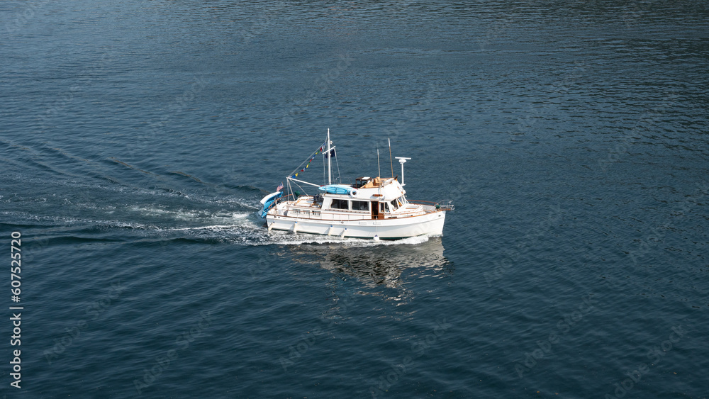 yacht boat in water. one yacht boat white color. yacht boat for summer trip. photo of yacht boat