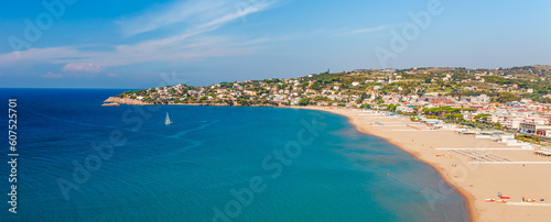 Fototapeta Naklejka Na Ścianę i Meble -  Panoramic sea landscape with Gaeta, Lazio, Italy. Scenic historical town with old buildings, ancient churches, nice sand beach and clear blue water. Famous tourist destination in Riviera de Ulisse