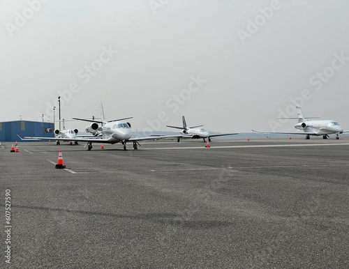 Fotografija sleek and elegant private jets on the airfield