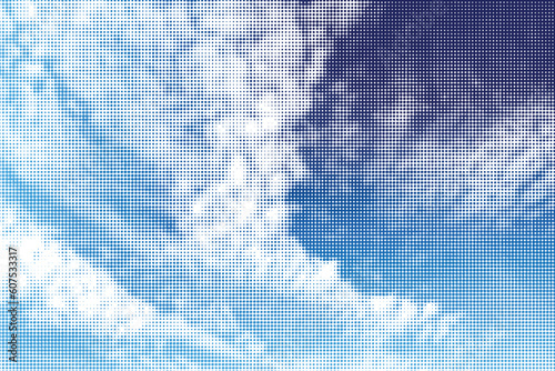 Halftone editable vector illustration of blue sky and clouds