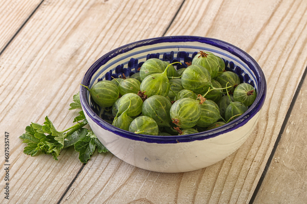 Natural ripe gooseberry heap in the bowl Natural ripe gooseberry heap in the bowl