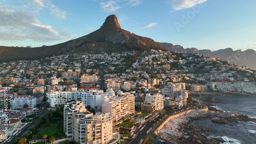 Aerial view of Atlantic Seaboard sunset with Lion’s Head Mountain, Bantry Bay and Sea Point from Atlantic Ocean, Cape Town, South Africa.