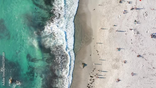Aerial view of people on Camps Bay beach in summer, Cape Town, South Africa. photo