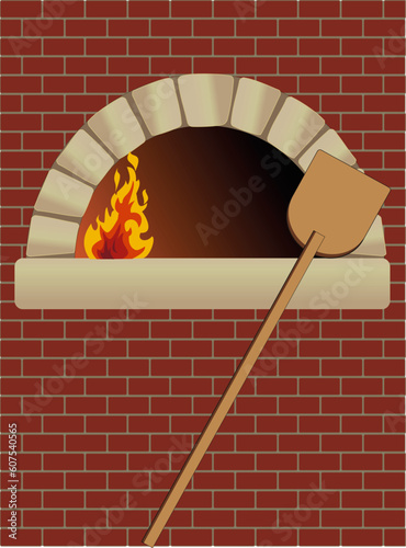 firewood oven with shovel on brick wall