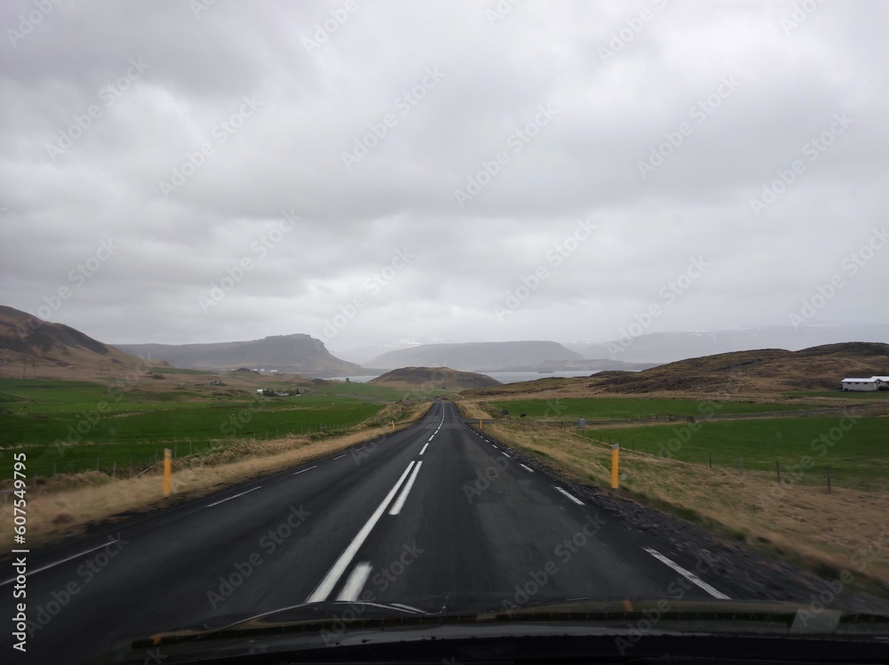 Fototapeta premium Lonely Road in Iceland with clouds