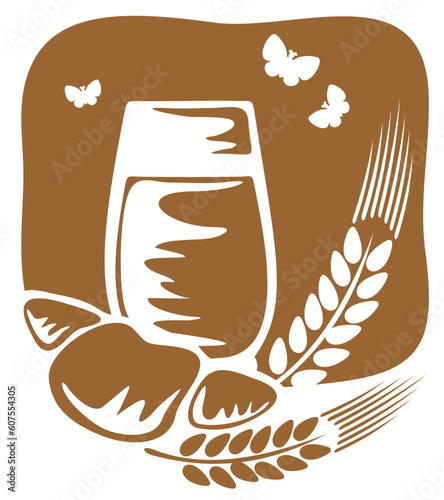 Glass of milk and croissant on a bronze background.