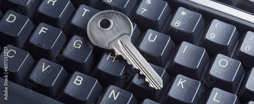 phishing, hacking personal data and money , key and hook on computer keyboard.