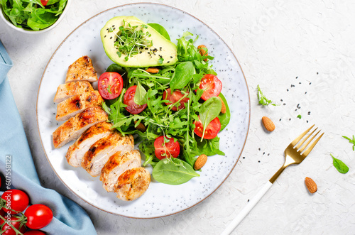 Grilled Chicken Fillet with Fresh Salad, Cherry Tomatoes and Avocado, Healthy food, Keto, Paleo Diet Menu
