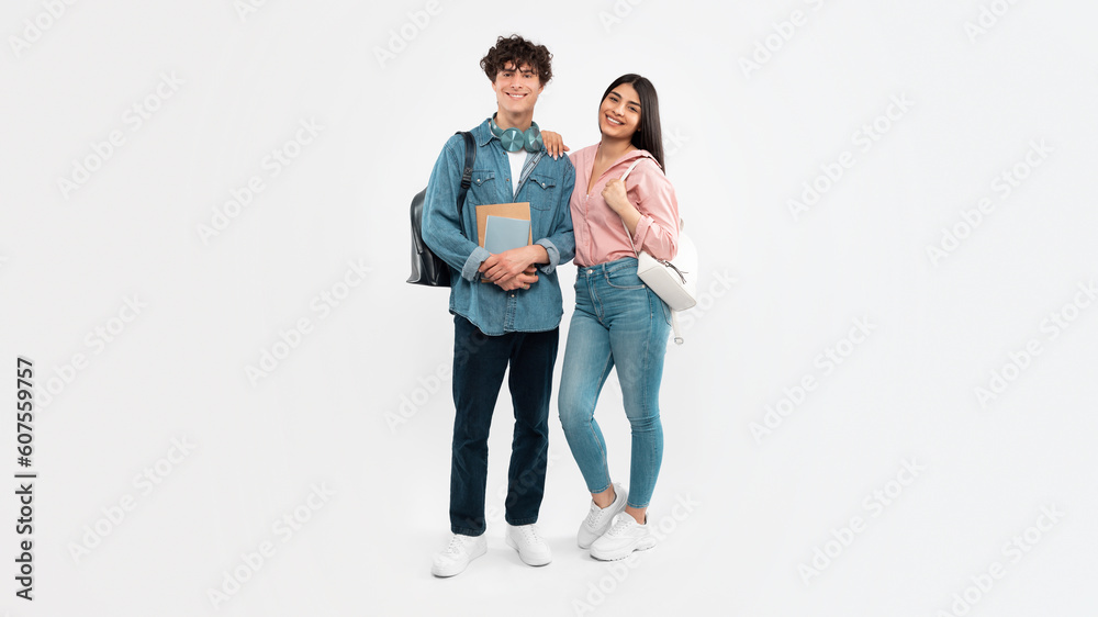 Students Boyfriend And Girlfriend Posing On White Background, Full Length