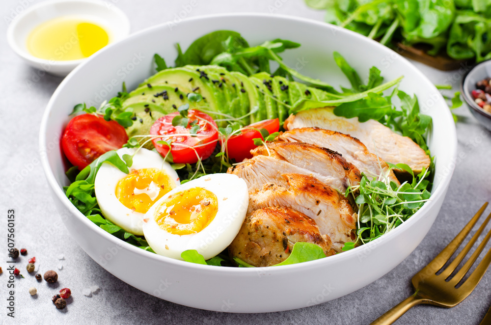 Grilled Chicken Fillet with Fresh Salad, Cherry Tomatoes, Boiled Egg and Avocado, Budha Bowl, Keto Paleo Diet Menu Grilled Chicken Fillet with Fresh Salad, Cherry Tomatoes, Boiled Egg and Avocado, Budha Bowl, Keto Paleo Diet Menu