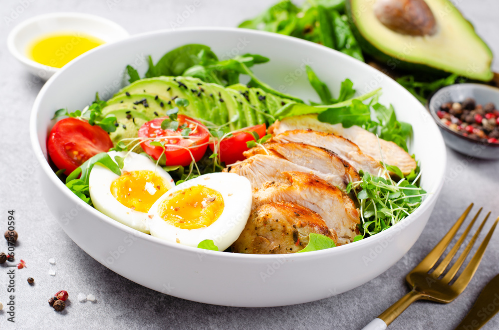 Grilled Chicken Fillet with Fresh Salad, Cherry Tomatoes, Boiled Egg and Avocado, Budha Bowl, Keto Paleo Diet Menu Grilled Chicken Fillet with Fresh Salad, Cherry Tomatoes, Boiled Egg and Avocado, Budha Bowl, Keto Paleo Diet Menu