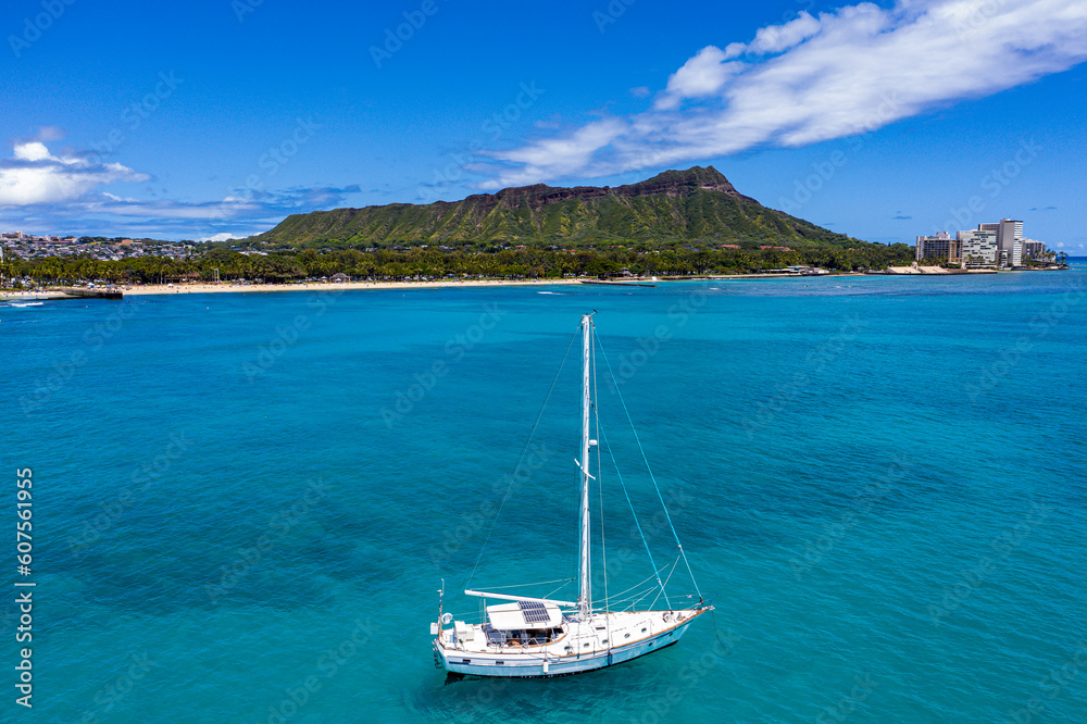 Sailboat Serenity: A Breathtaking Aerial View of Hawaii's Coastal Paradise