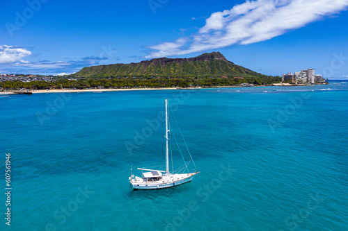 Sailboat Serenity: A Stunning Aerial View of Hawaii's Coastal Beauty