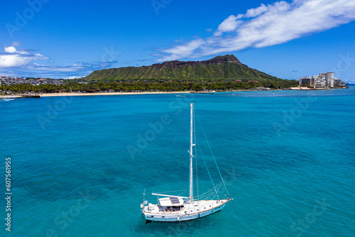 Sailboat Serenity: A Breathtaking Aerial View of Hawaii's Coastal Paradise © BEEWHYLD