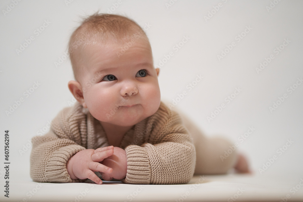 Portrait of a crafty baby. newborn baby, studio shot Portrait of a crafty baby. newborn baby, studio shot