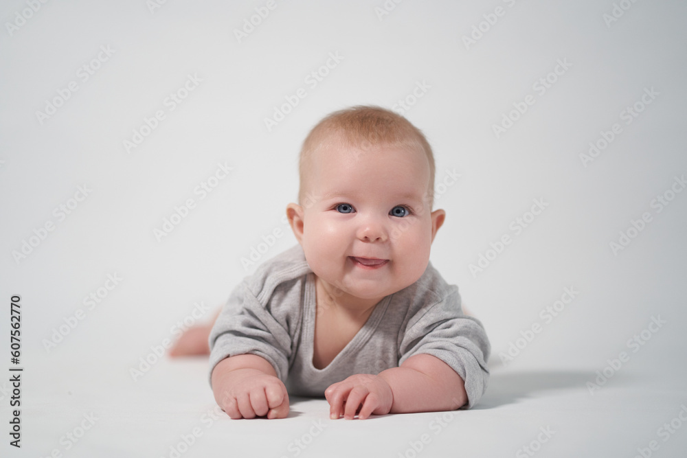 smiling baby looks at operator smiling baby looks at operator