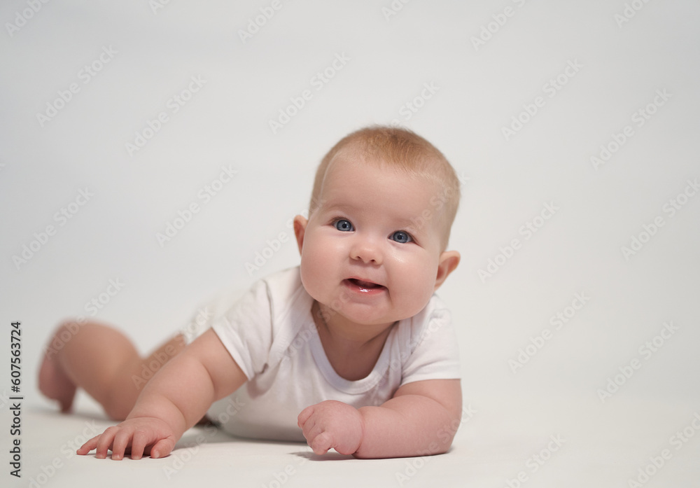 Smiling Newborn Baby on White Background Smiling Newborn Baby on White Background