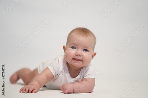Smiling Newborn Baby on White Background