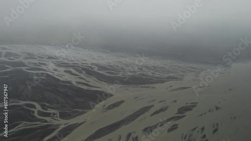 Aerial view of water formation at river estuary near Fjorur beach, Iceland. photo