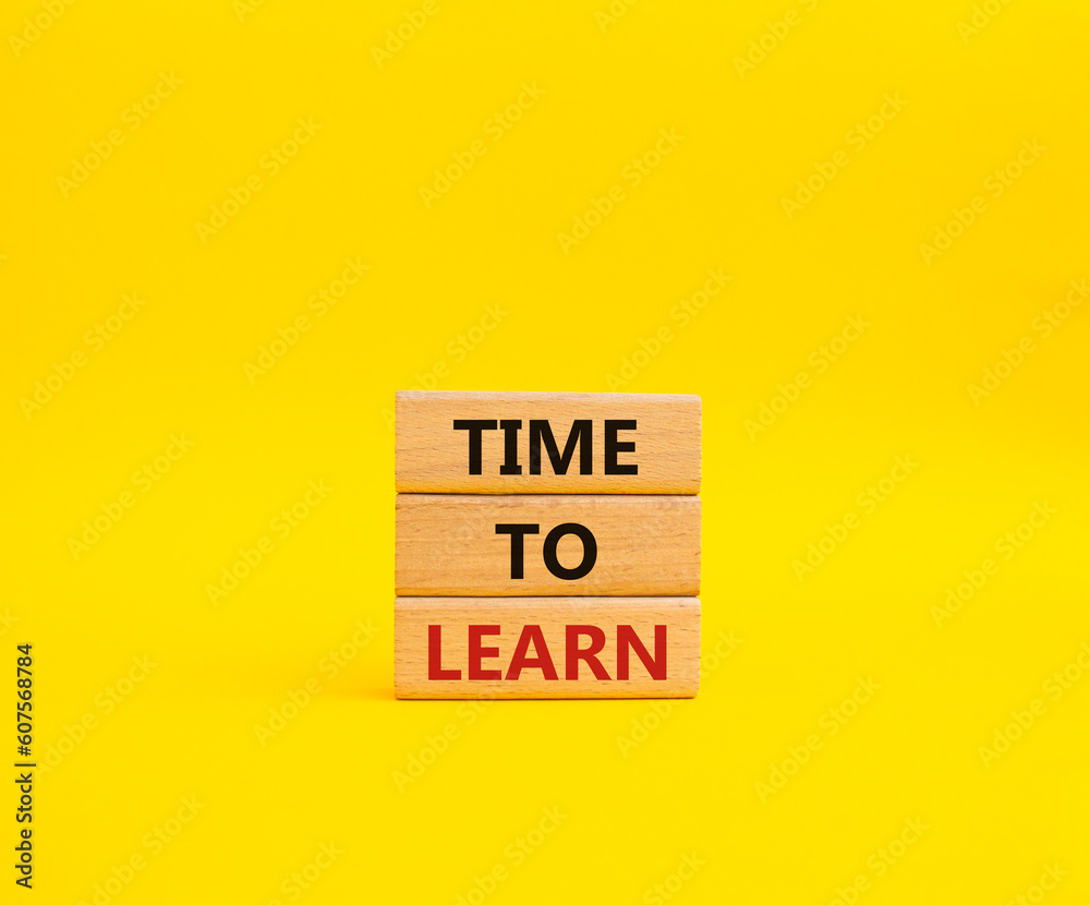 Time to learn symbol. Wooden blocks with words Time to learn. Beautiful yellow background. Business and Time to learn concept. Copy space. Time to learn symbol. Wooden blocks with words Time to learn. Beautiful yellow background. Business and Time to learn concept. Copy space.
