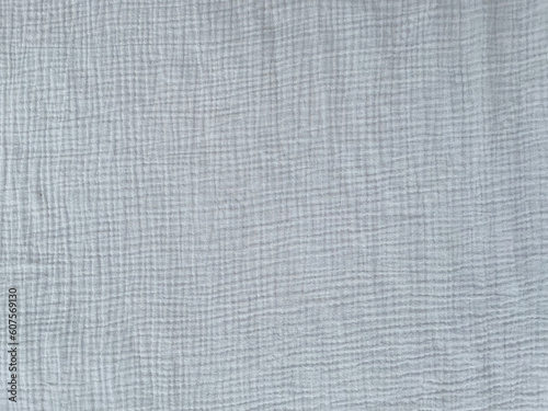Muslin cloth texture background in grey tones. Muslin cotton fabric 