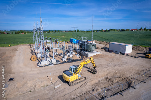 Obraz na płótnie a new power substation is built on a field w salonie
