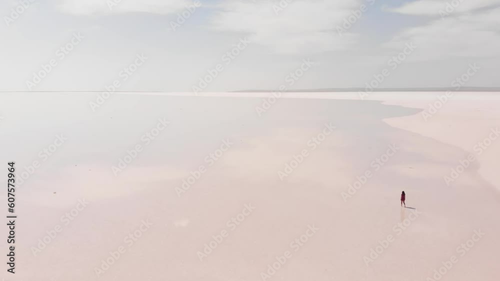 Aerial view young caucasian woman alone walk and explore Tuz salt lake in central anatolia, Turkey Aerial view young caucasian woman alone walk and explore Tuz salt lake in central anatolia, Turkey