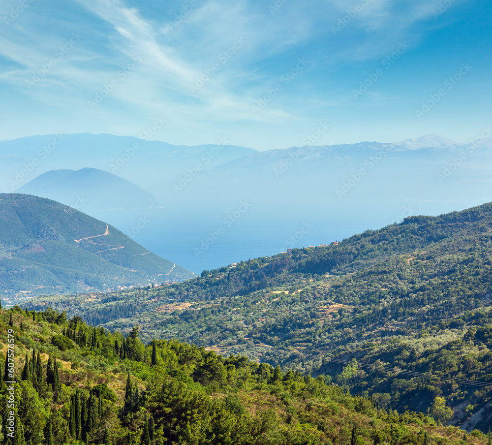 Misty summer hilly coast panorama (Greece, Lefkada). View from up.