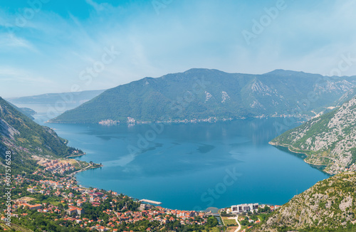 Bay of Kotor summer misty view from up and Kotor town on coast (Montenegro). 