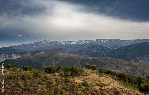 Clouds over the mountains of Sierra Nevada in Andalucia Spain
