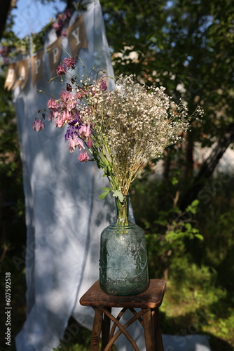 wildflowers in an old vintage vase