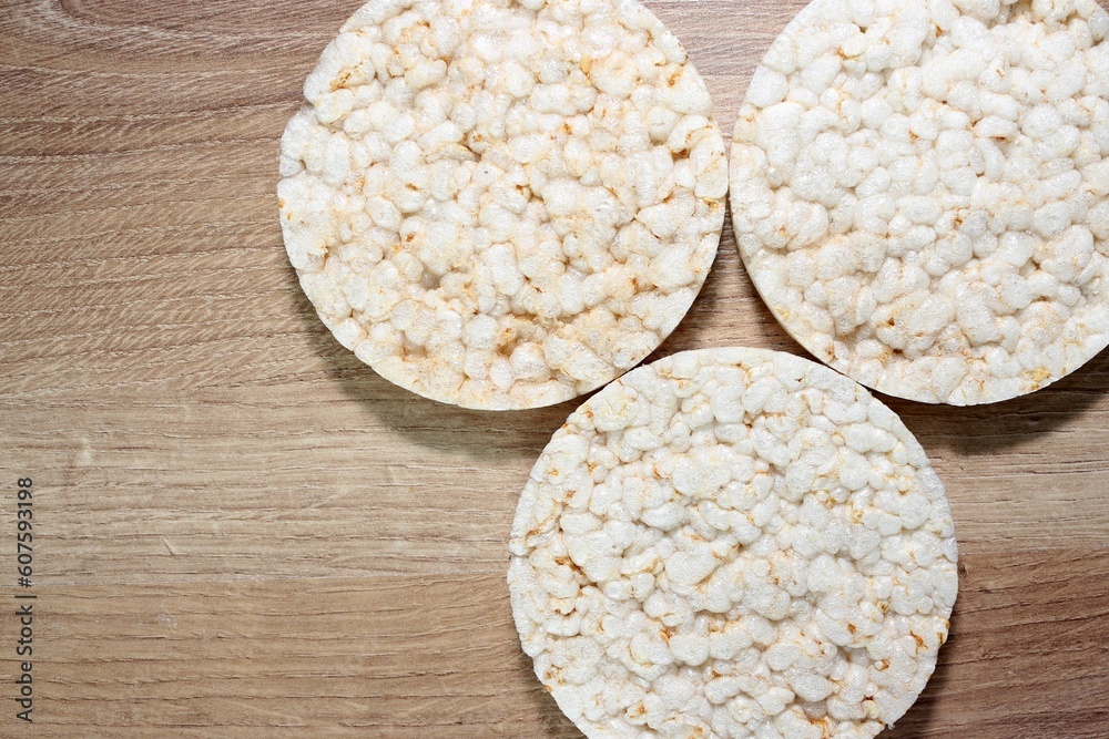 white rice in a bowl on wooden table white rice in a bowl on wooden table