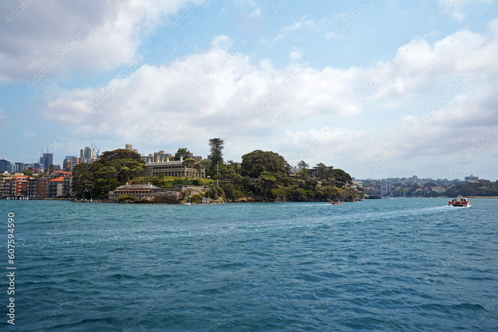 View of Admiralty house and Kirribilli from the ferry, a harbourside suburb on the Lower North Shore of Sydney Harbour.