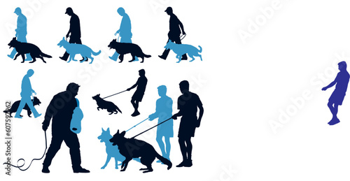 Young German Shepherd dogs at their work at the dog school with their leaders