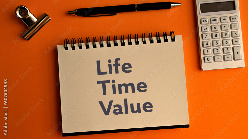 There is notebook with the word Life Time Value. It is as an eye-catching image. - obrazy, fototapety, plakaty 