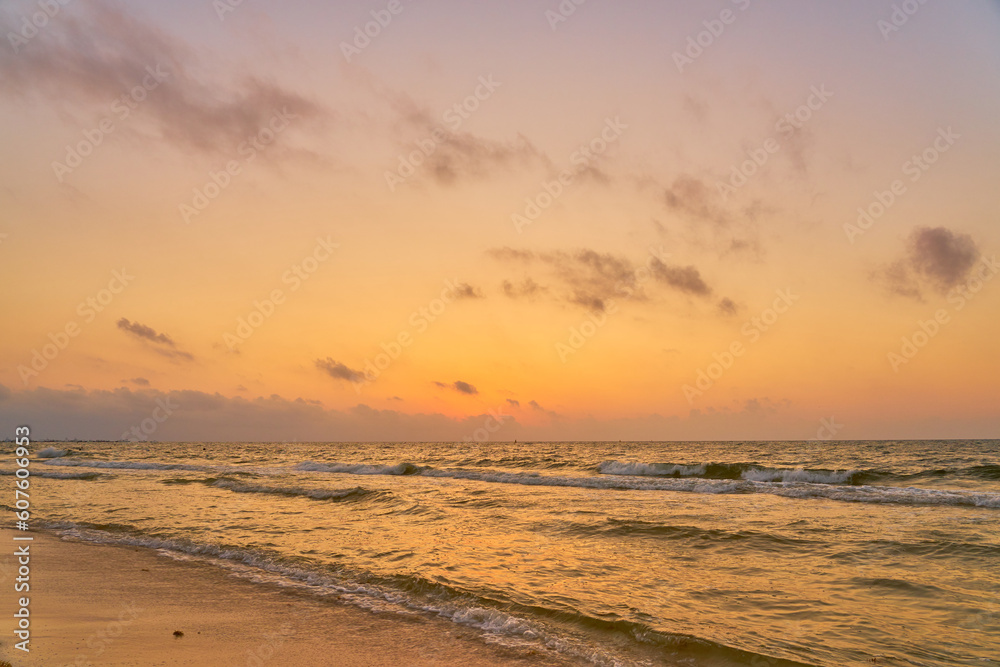 A colorful sunrise on the Caribbean coast on the Mexico.