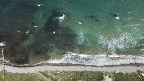 Aerial view of waves rolling on the shoreline along the Marmara Sea coastline, Sevketiye, Lapseki, Turkey. photo