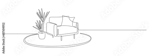 One continuous Line drawing of armchair and potted plant on carpet. Stylish furniture for living and office room interior in simple linear style. Editable stroke. Vector illustration